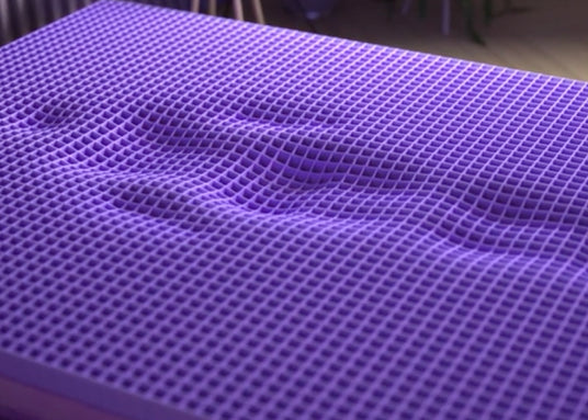 Purple grid with person silhouetted