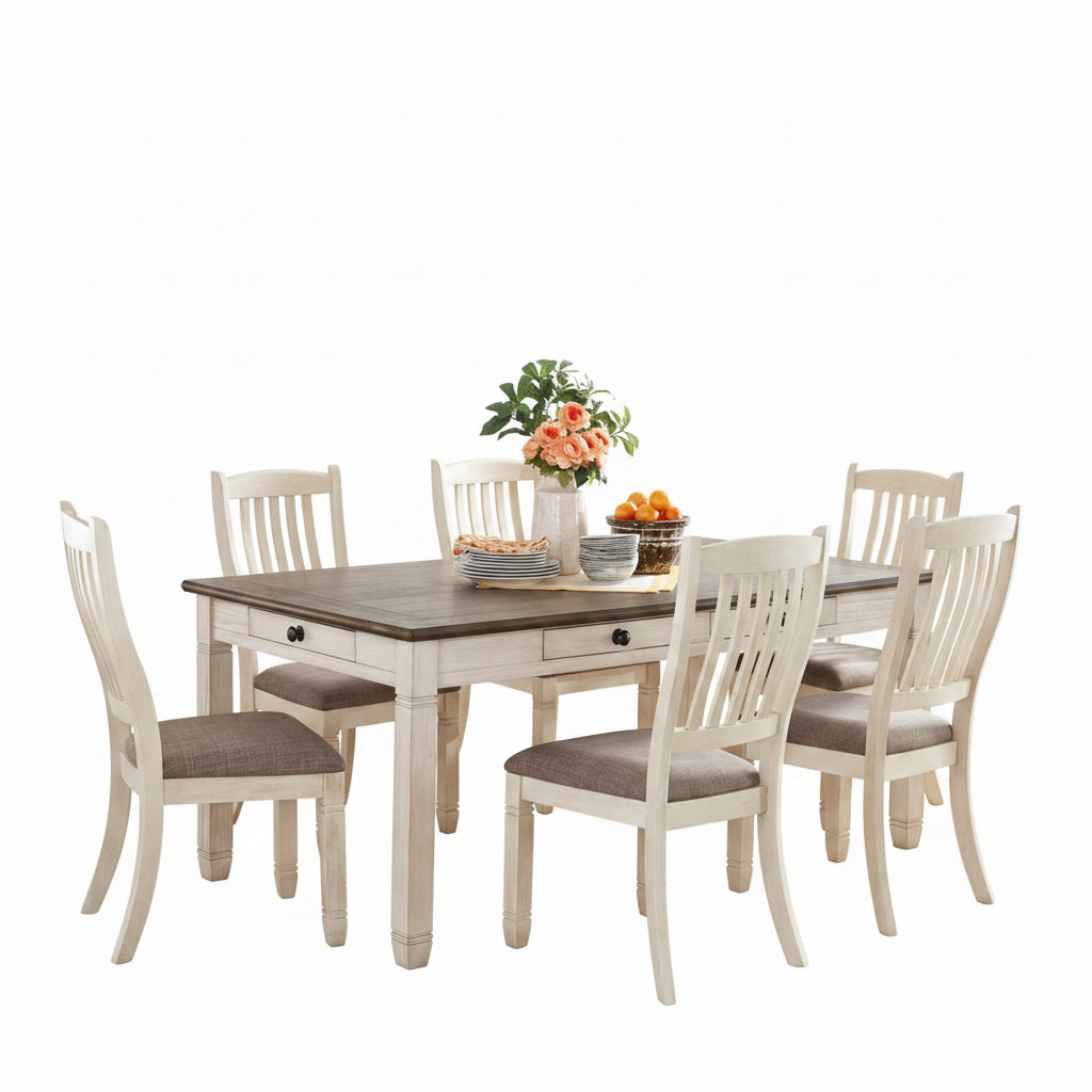A 5 piece dining set with a farmhouse style. The set includes a rectangular table with a rosy brown tabletop and white finished legs, apron, and six drawers.