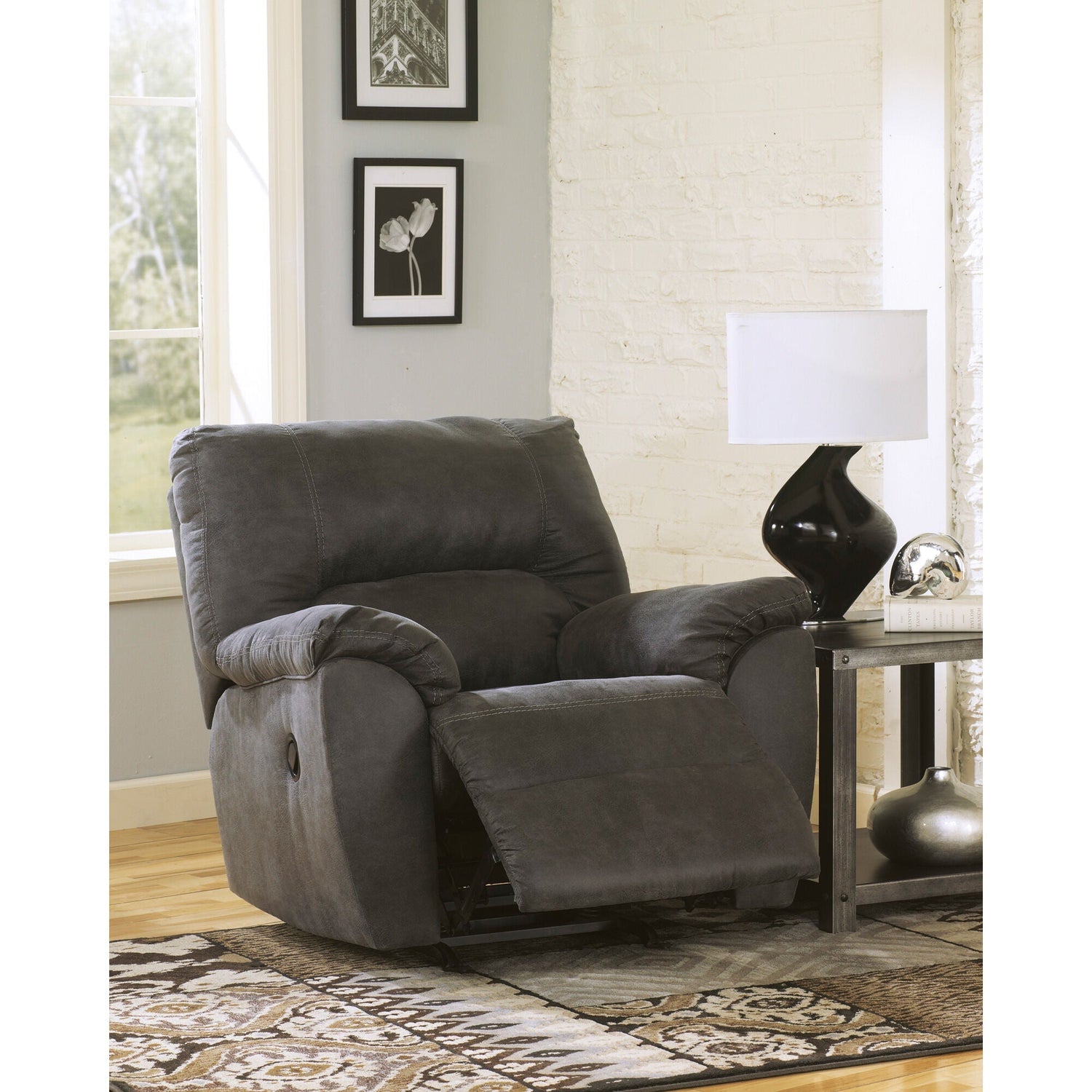 A room setting featuring Grover Gray Rocker Recliner