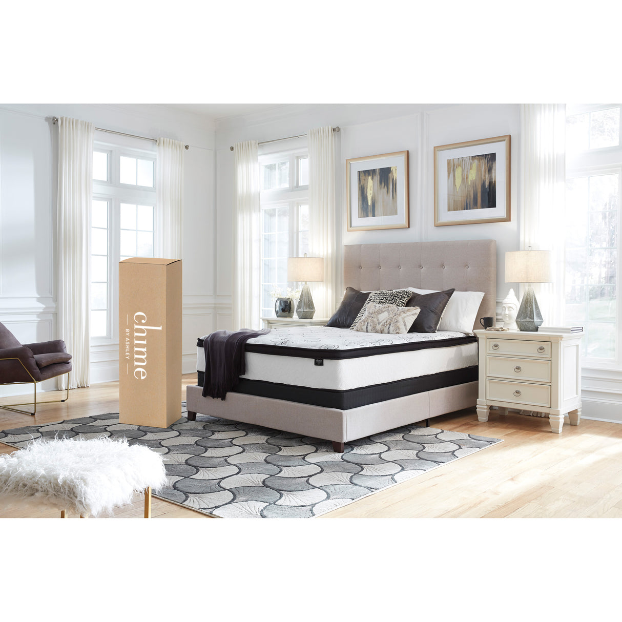A room setting featuring Ashley Chime 12 Inch Hybrid King Mattress