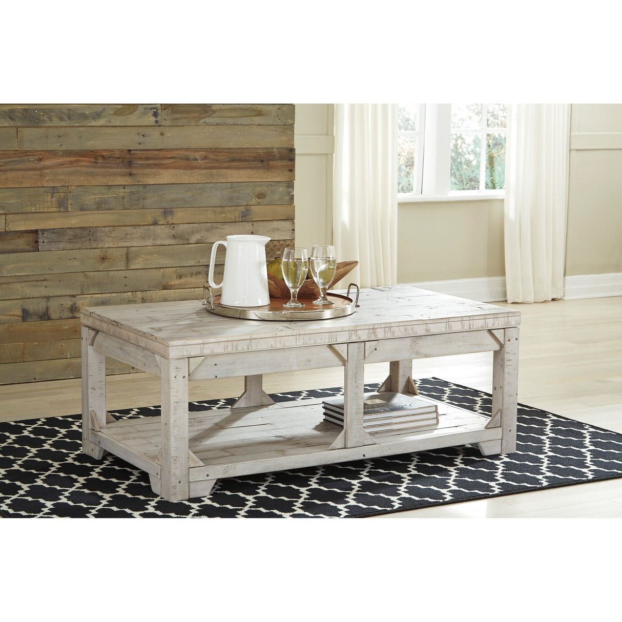 A room setting featuring Fregine Whitewash Lift Top Coffee Table