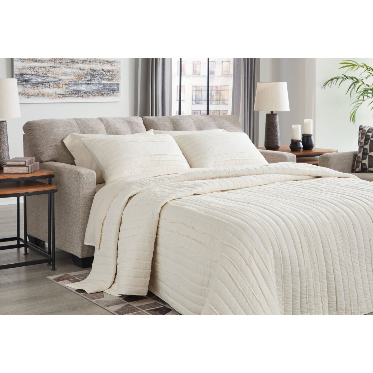 A room setting featuring Mahoney Pebble Full Sofa Sleeper