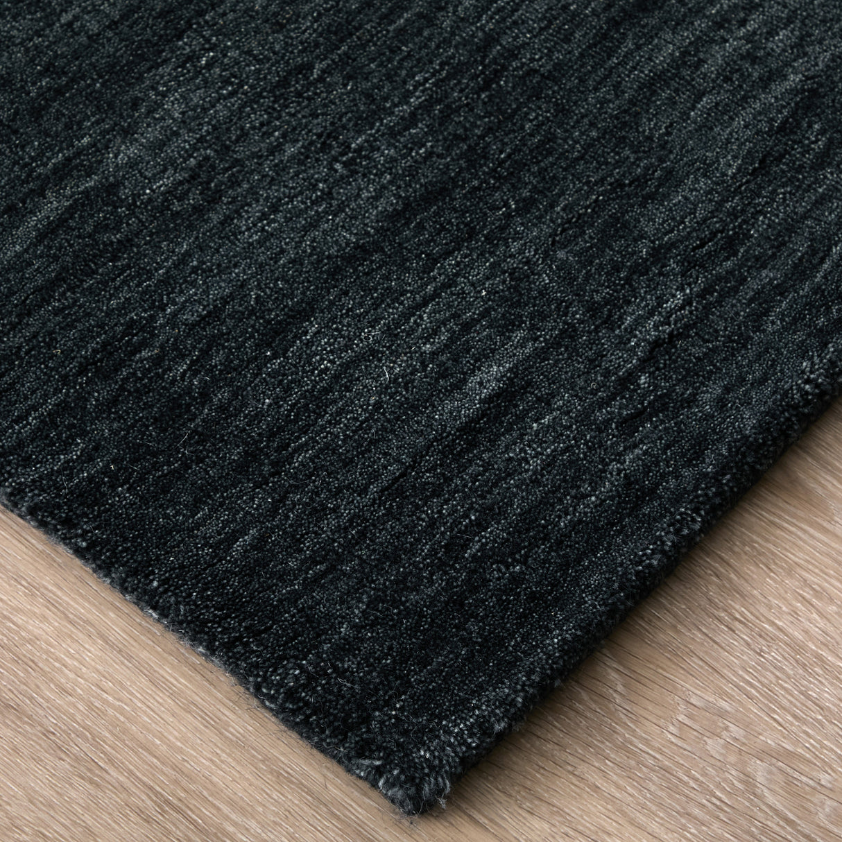 Front left view of Luna Black 9x13 Rug