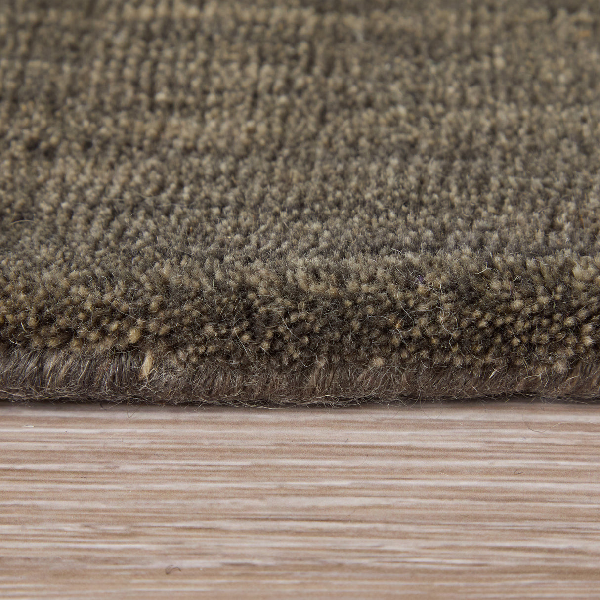 Side view of Luna Charcoal 9x13 Rug