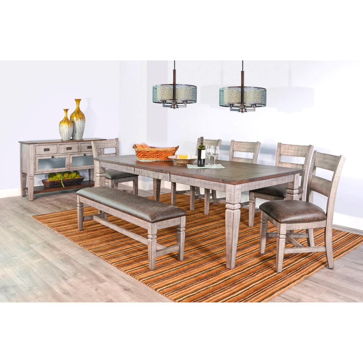 A room setting featuring Homestead Hills Alpine Gray Extension Dining Table