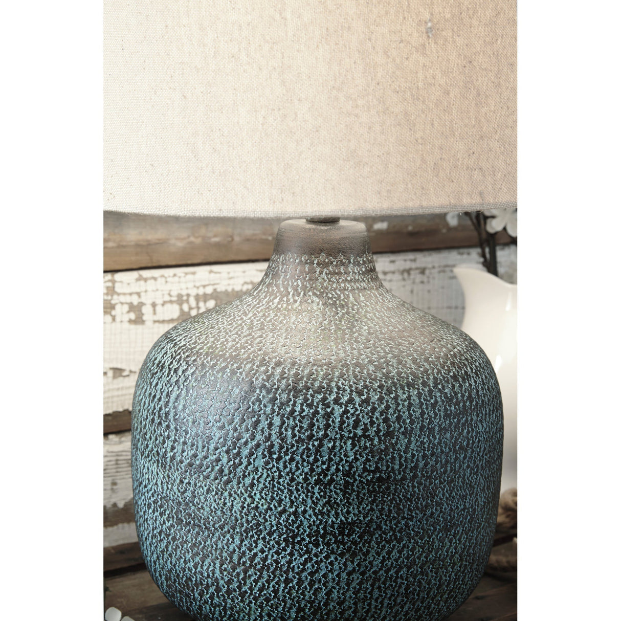 Detail view of Malthace Patina Table Lamp