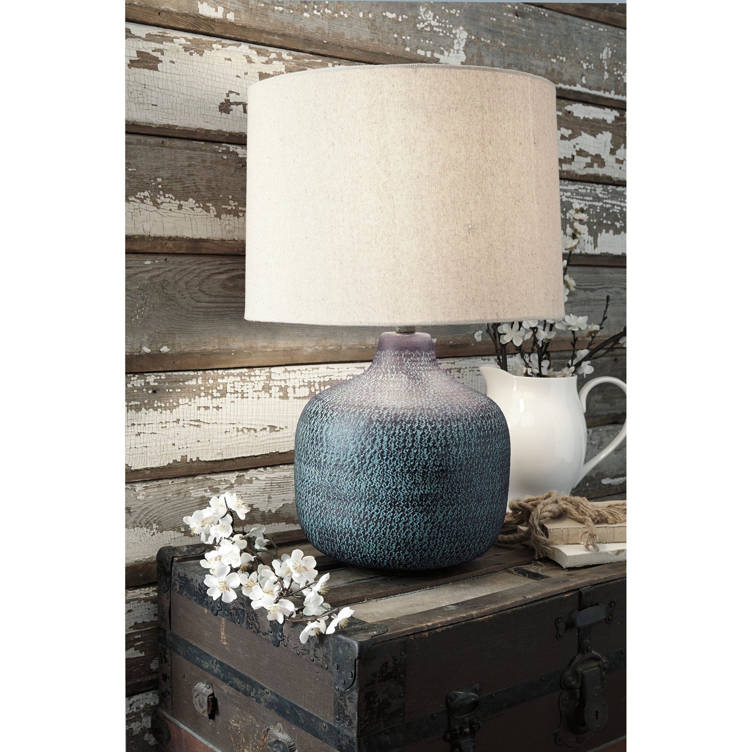 A room setting featuring Malthace Patina Table Lamp