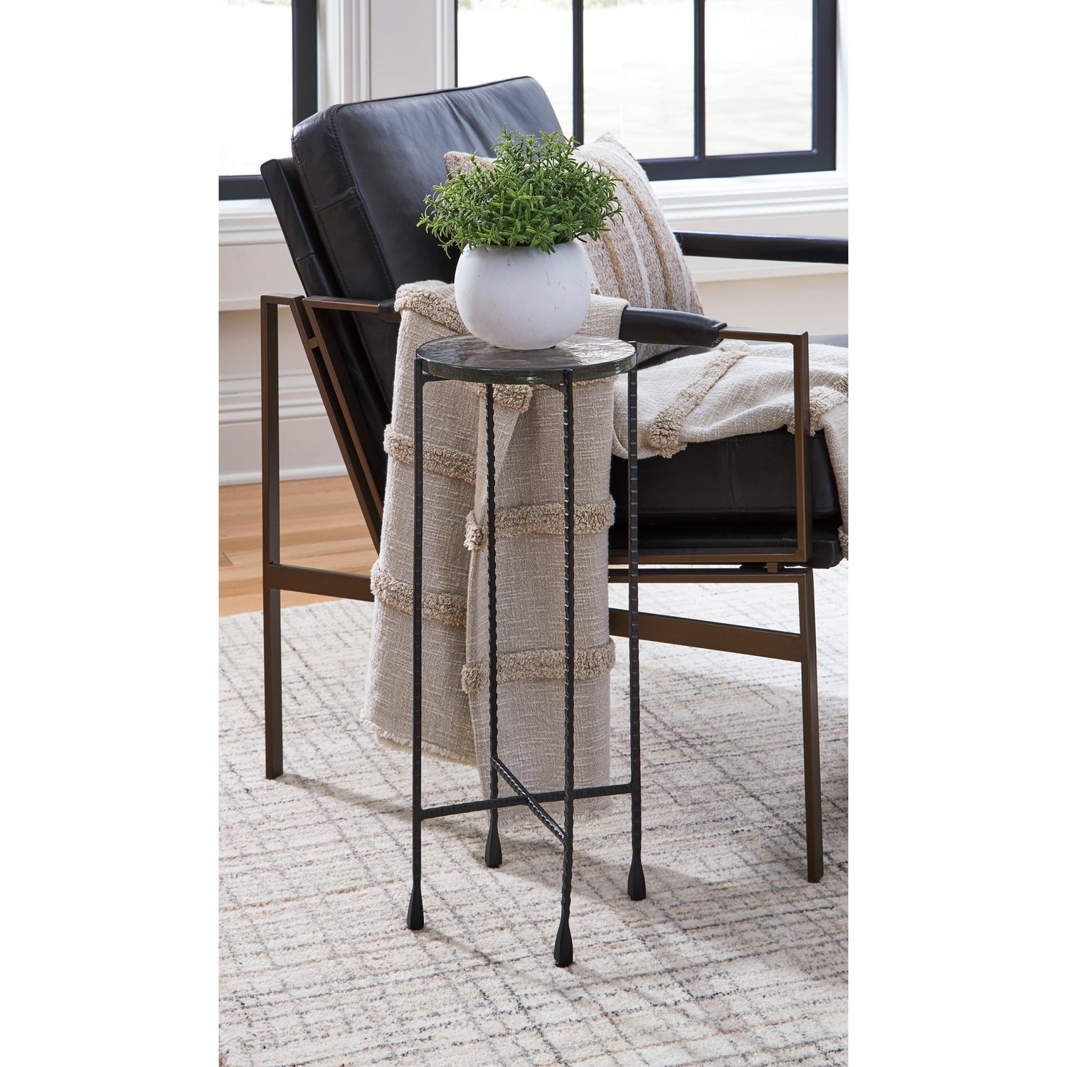 A room setting featuring Newgoren Black Accent Table