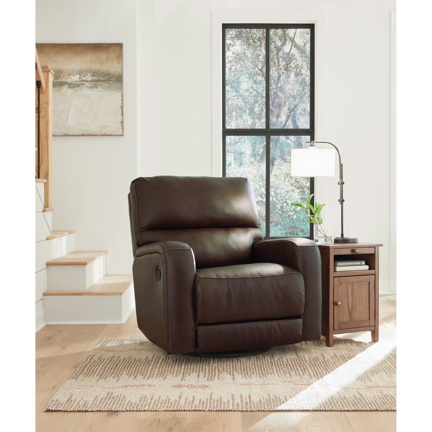 A room setting featuring Emberla Coffee Swivel Glider Recliner