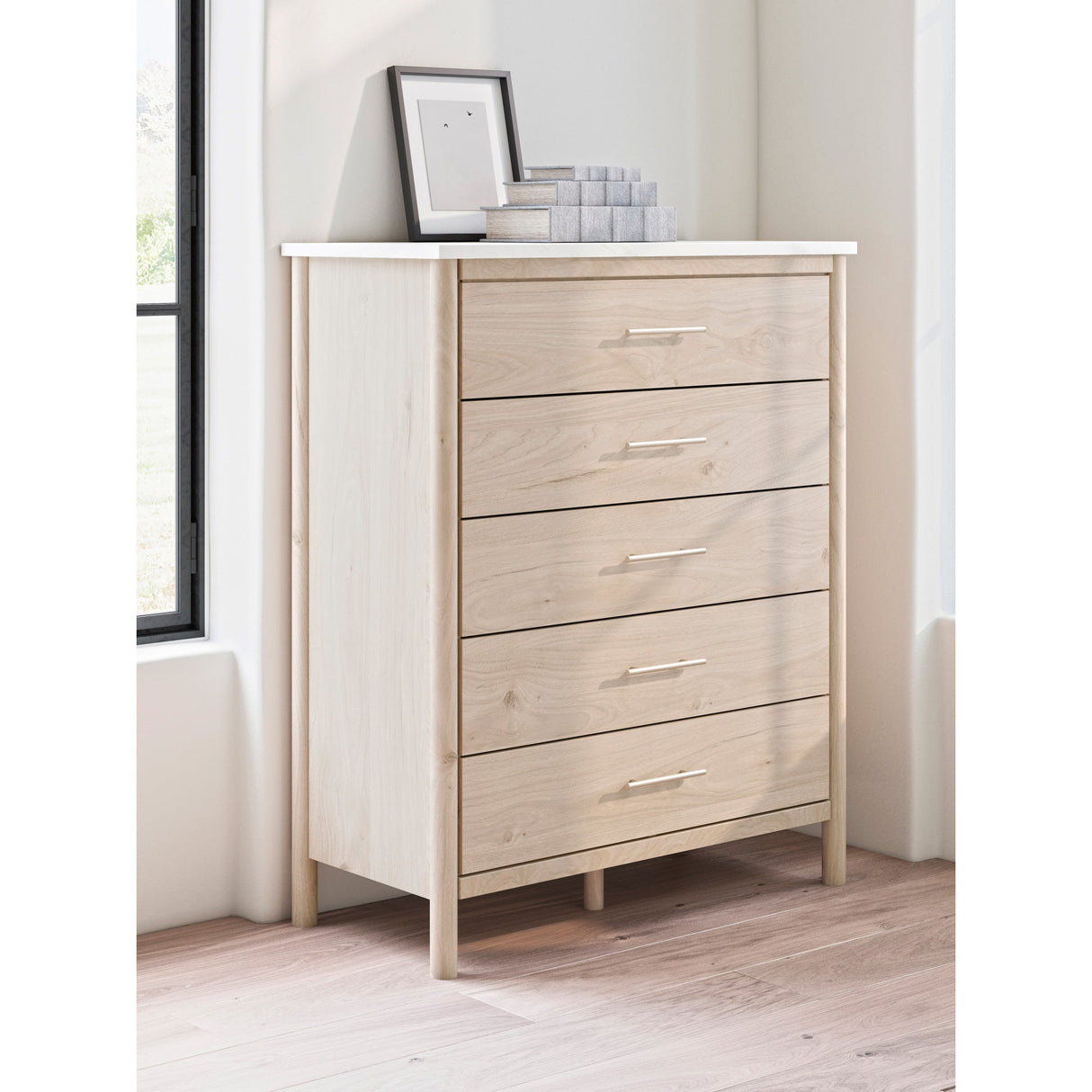 A room setting featuring Cadmori Natural Chest