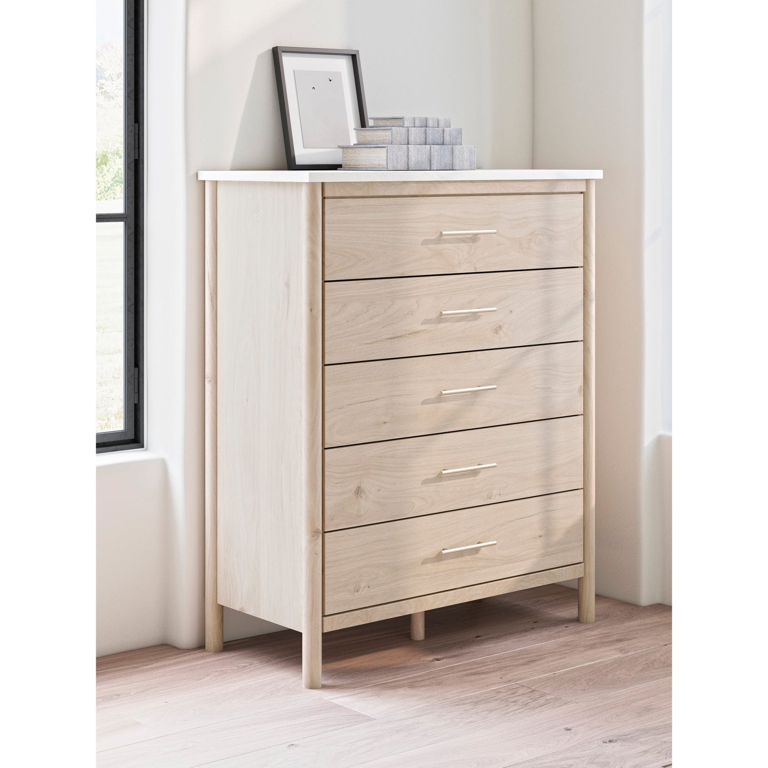 A room setting featuring Cadmori Natural Chest