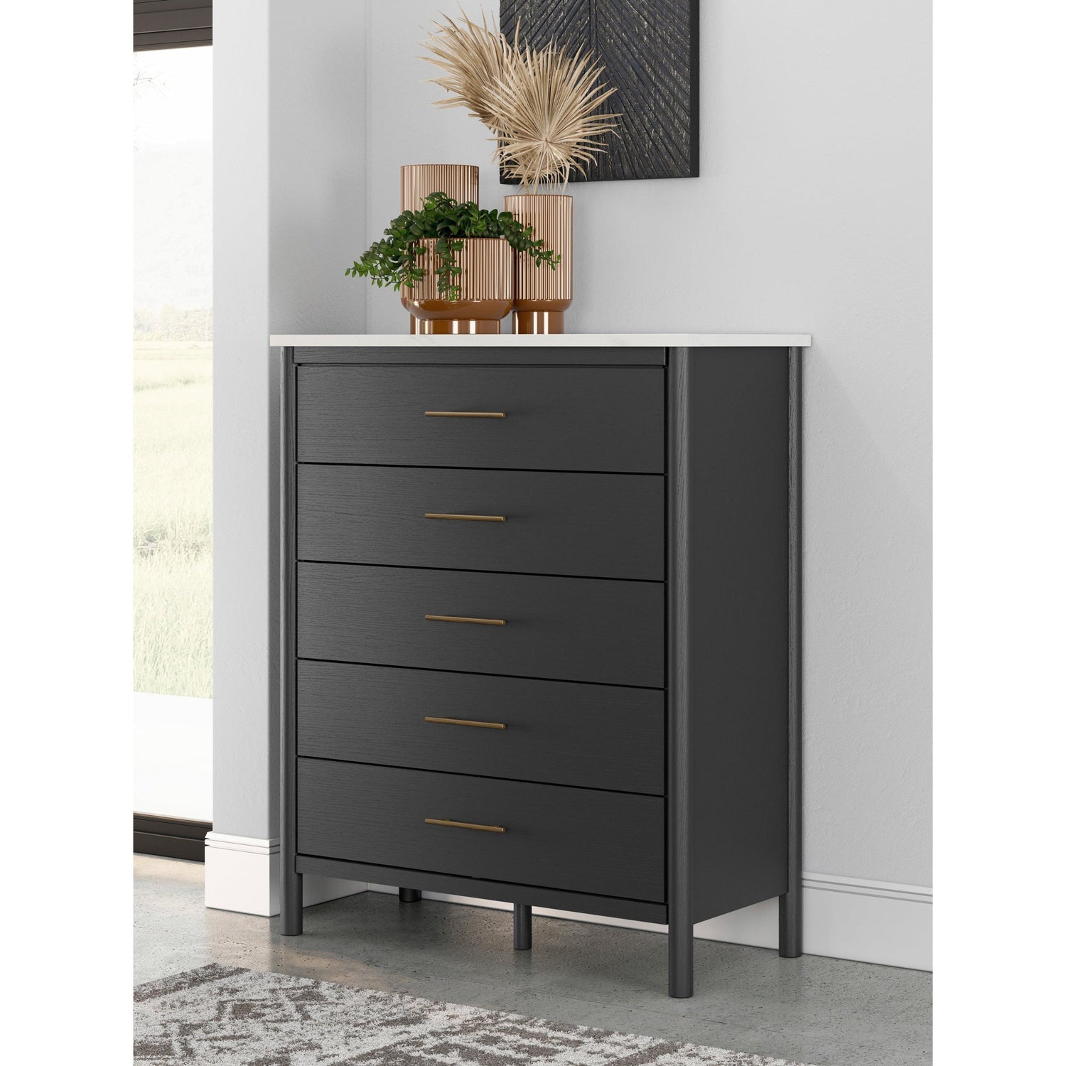 A room setting featuring Cadmori Black Chest