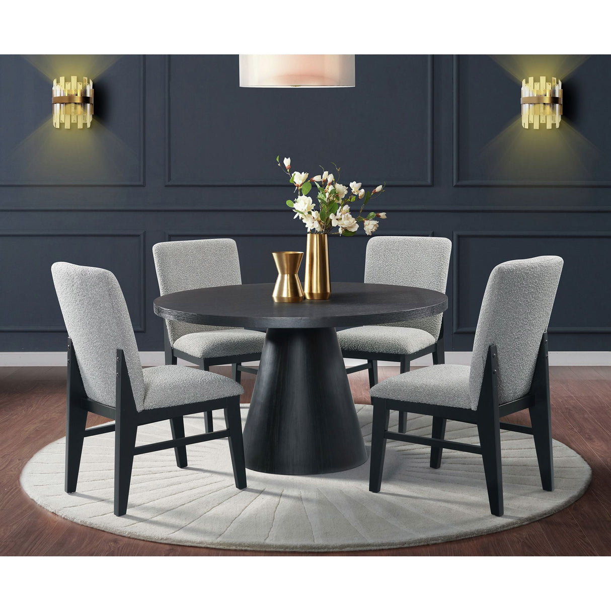 A room setting featuring Portland Black 5 Piece Round Dining Set
