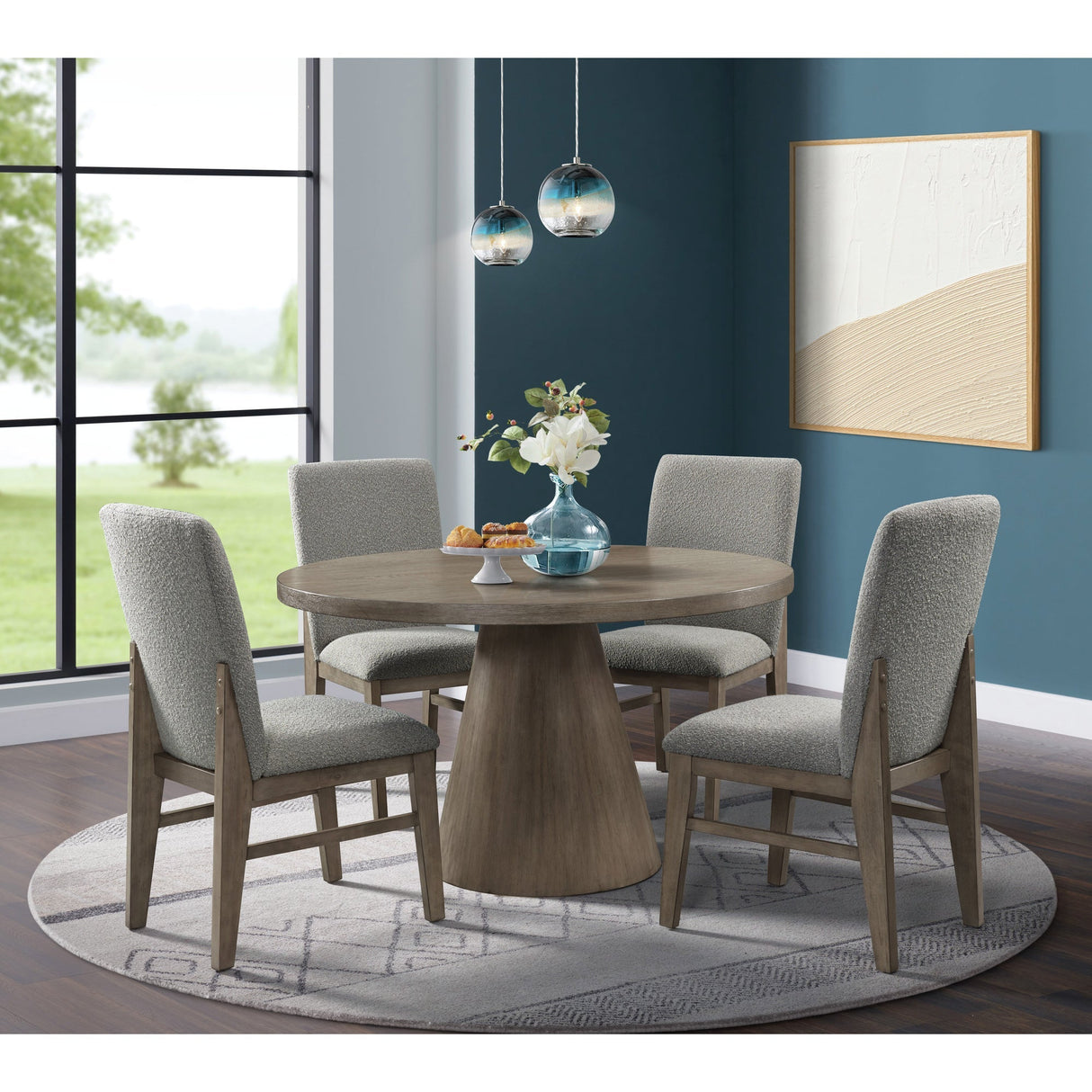 A room setting featuring Portland Gray 5 Piece Round Dining Set
