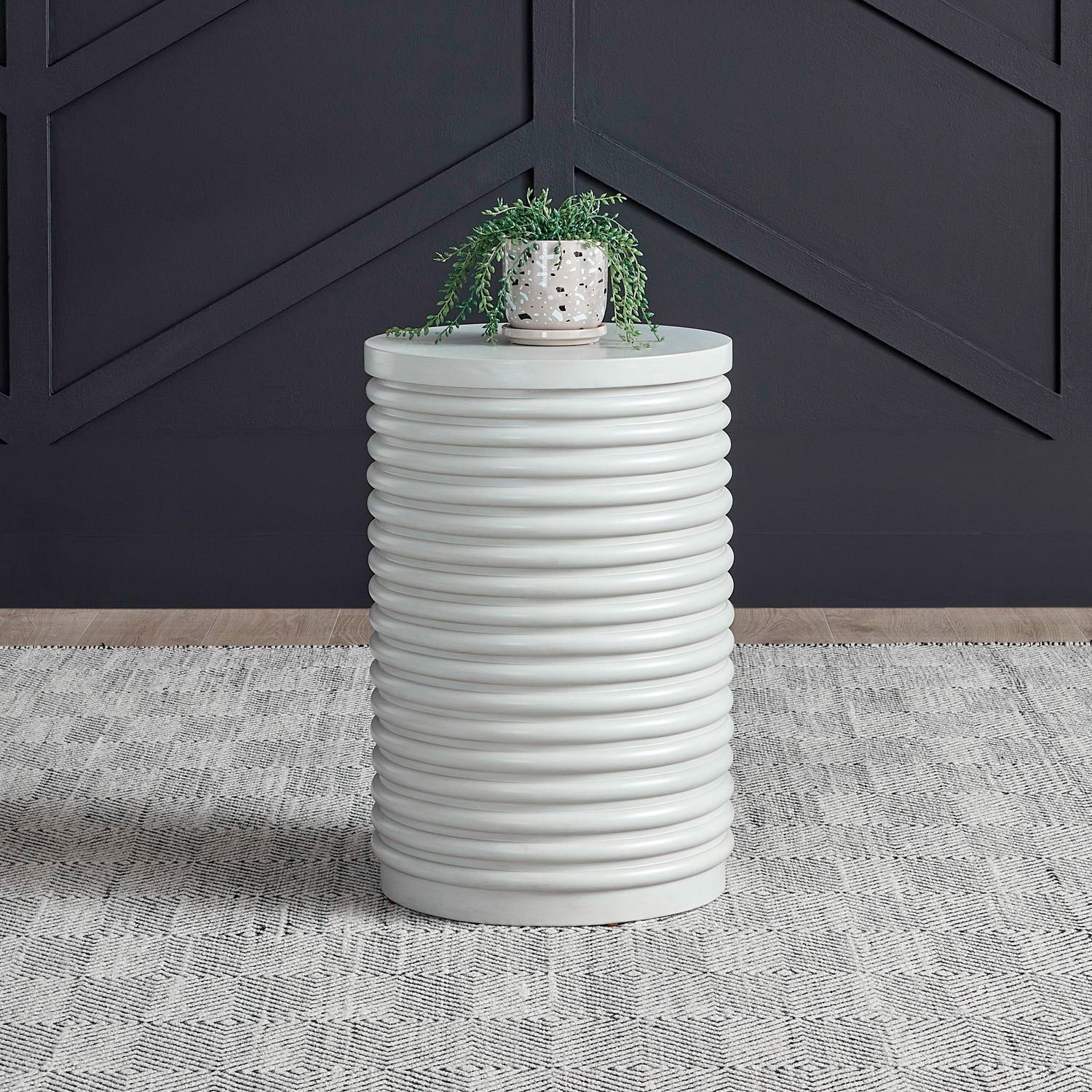 A room setting featuring Berkley Square Linen Drum Chairside Table