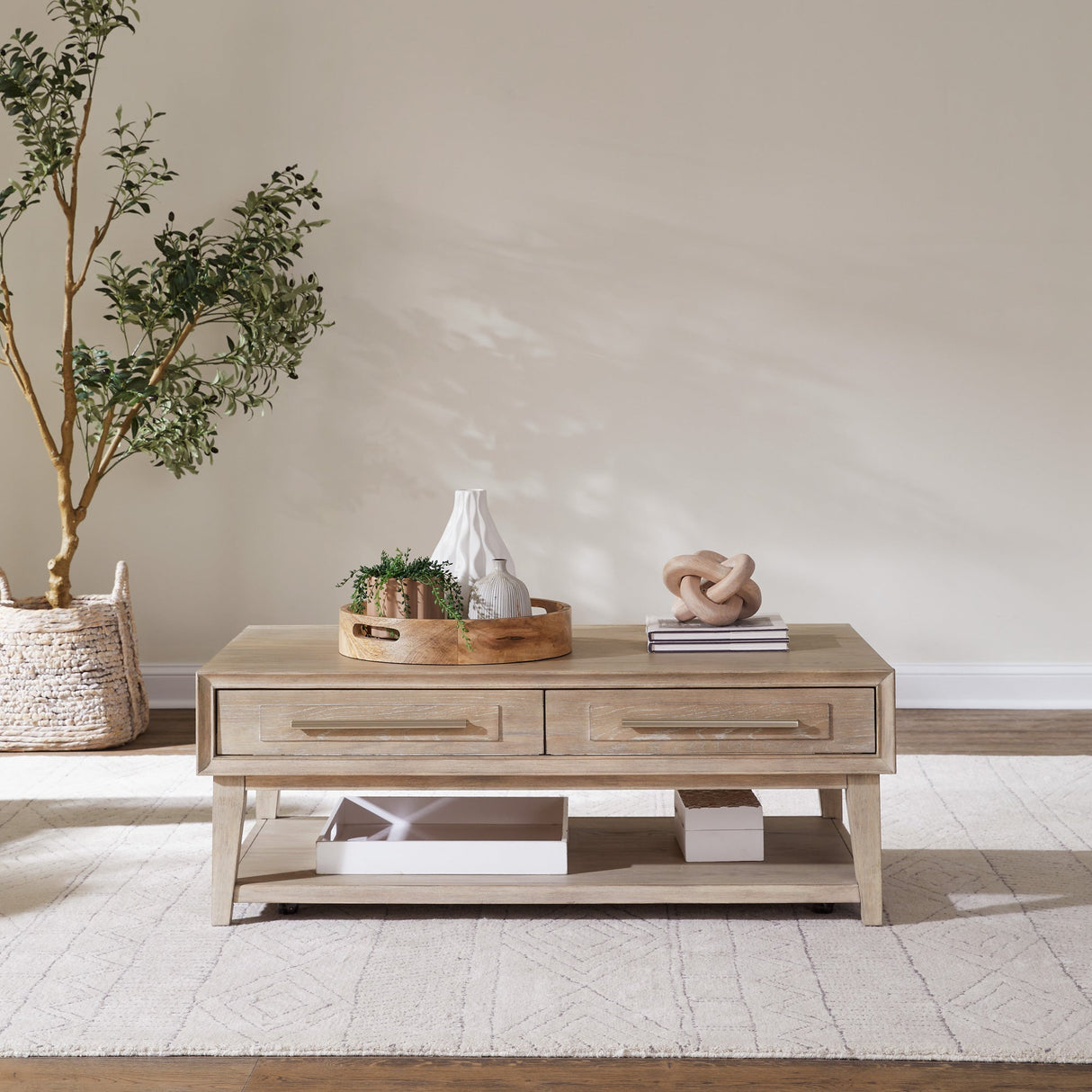A room setting featuring Brentwood Sandstone Coffee Table
