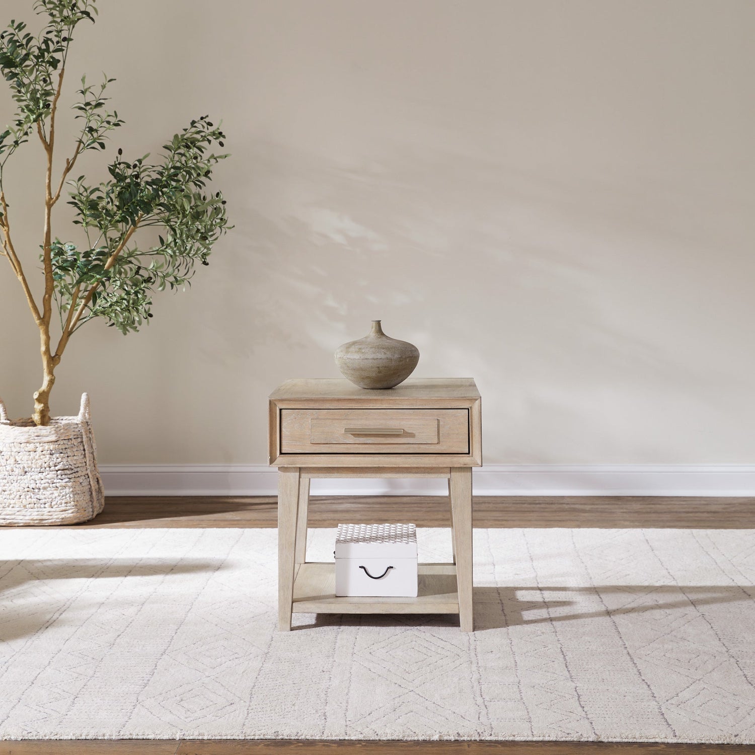 A room setting featuring Brentwood Sandstone End Table