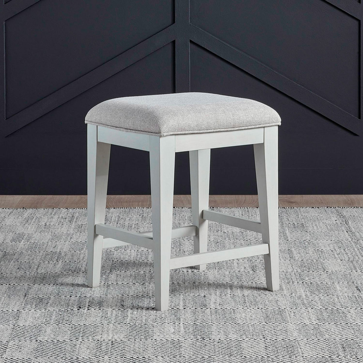 A room setting featuring Berkley Square Linen Upholstered Counter Stool