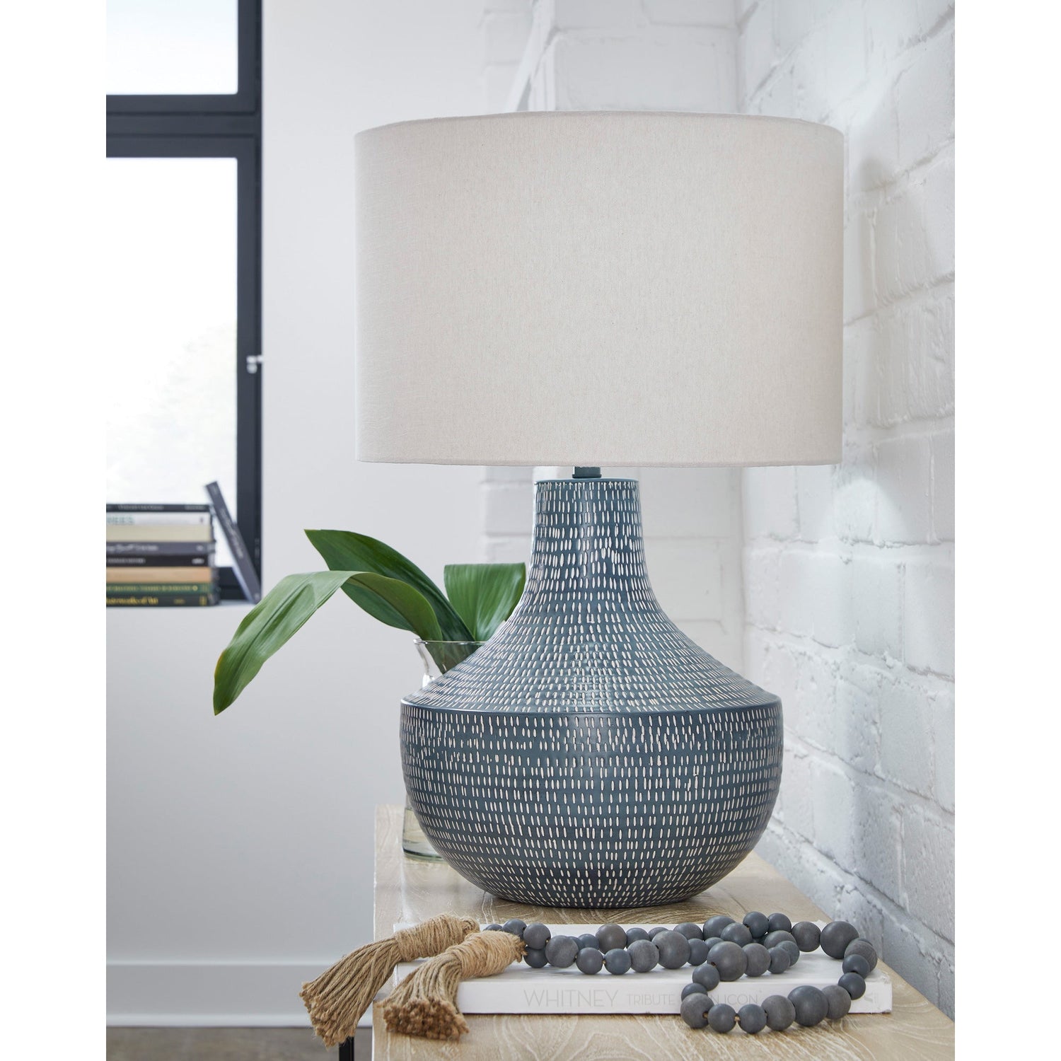 A room setting featuring Elena Cerulean Table Lamp