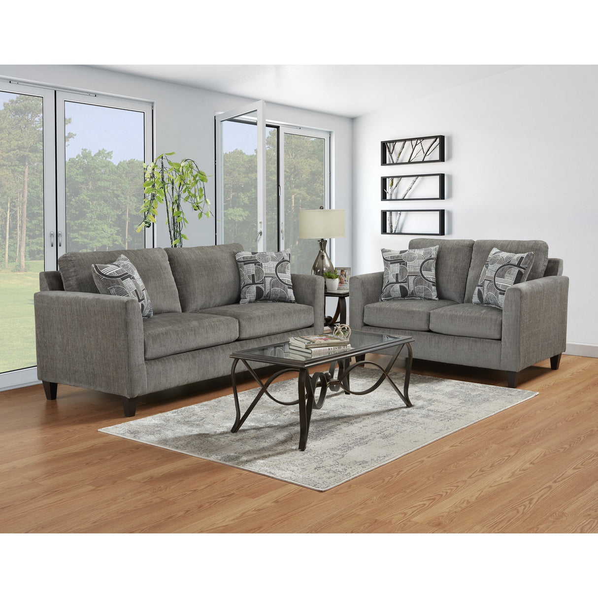 A room setting featuring Kyla Charcoal Loveseat