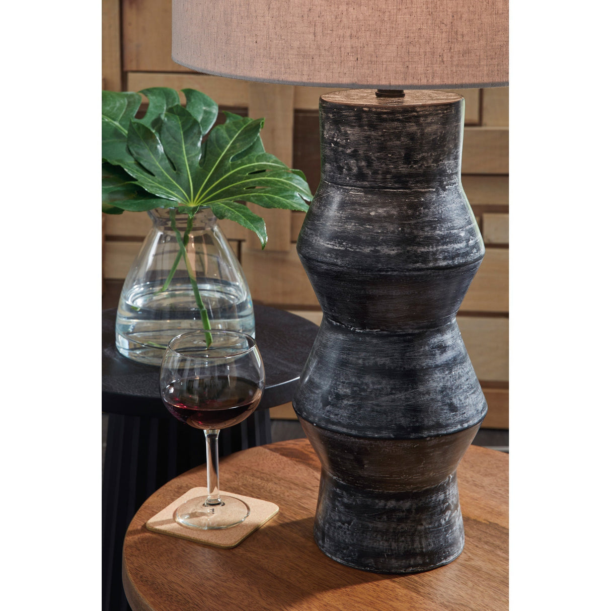 Room setting 2 featuring Kerbert Distressed Black Table Lamp