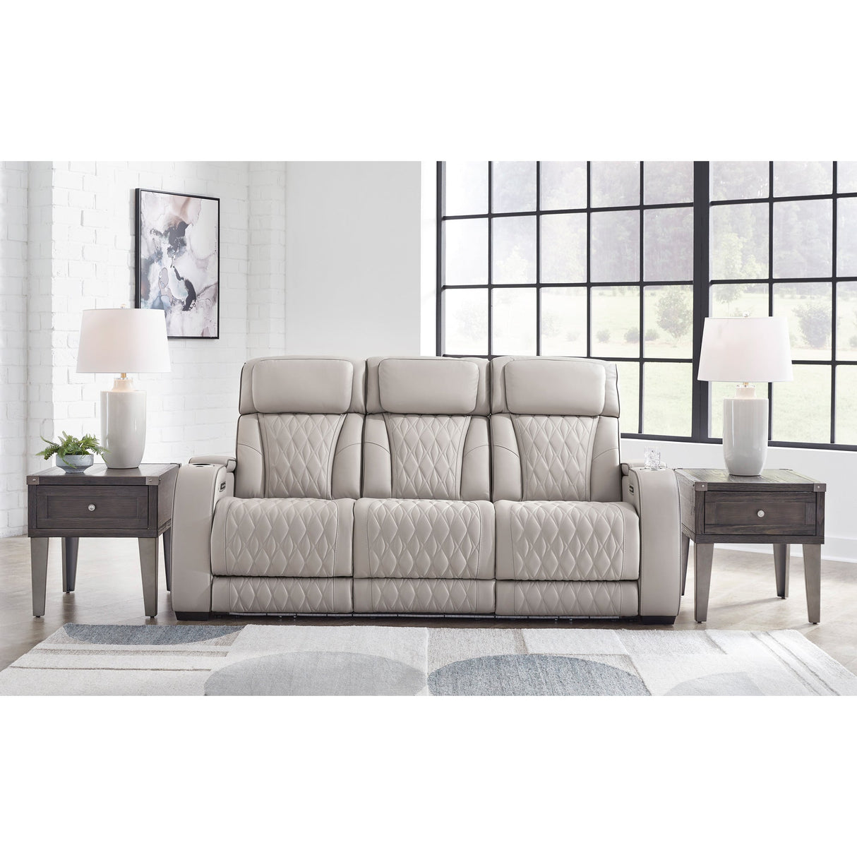 A room setting featuring Boyington Gray Power Reclining Sofa