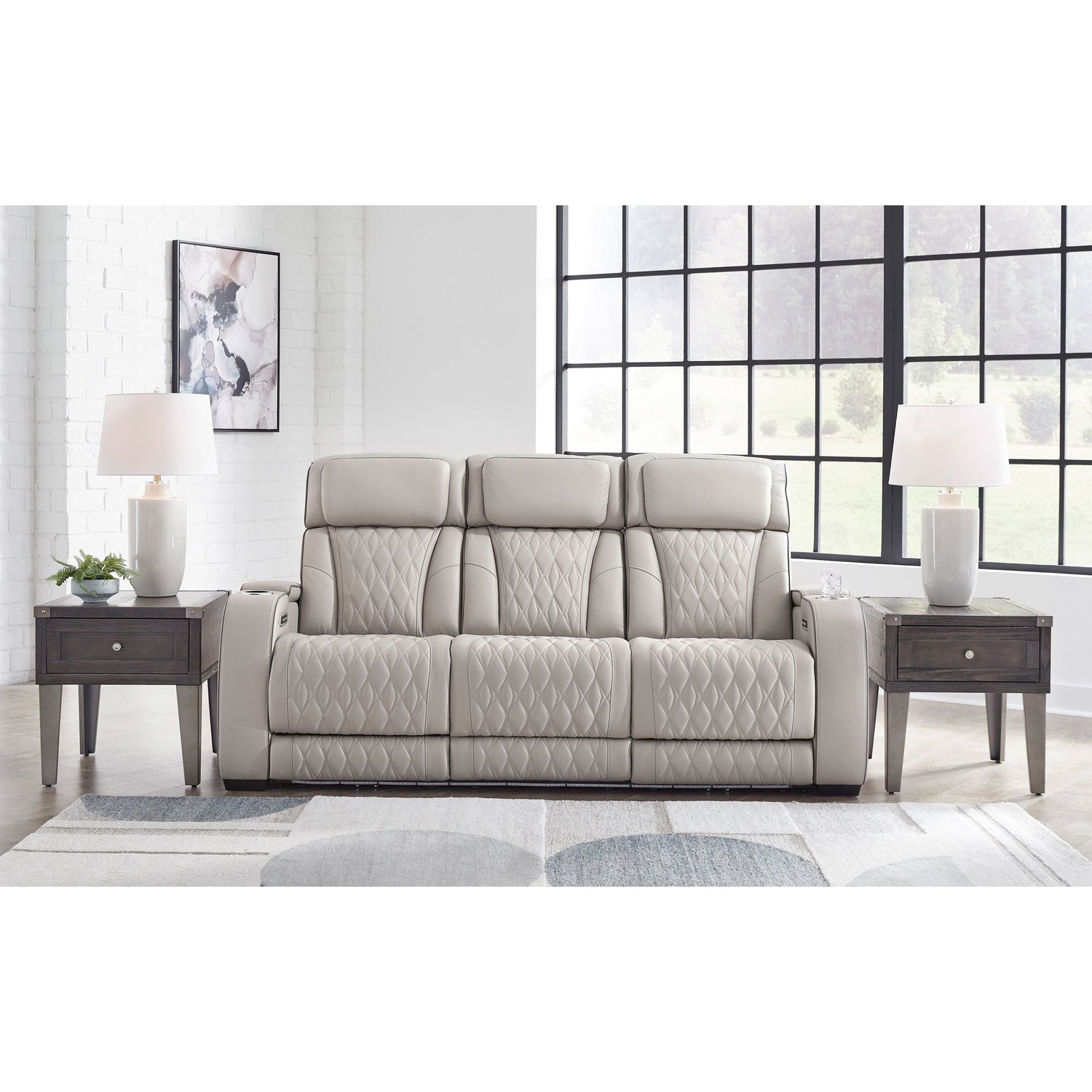 A room setting featuring Boyington Gray Power Reclining Sofa