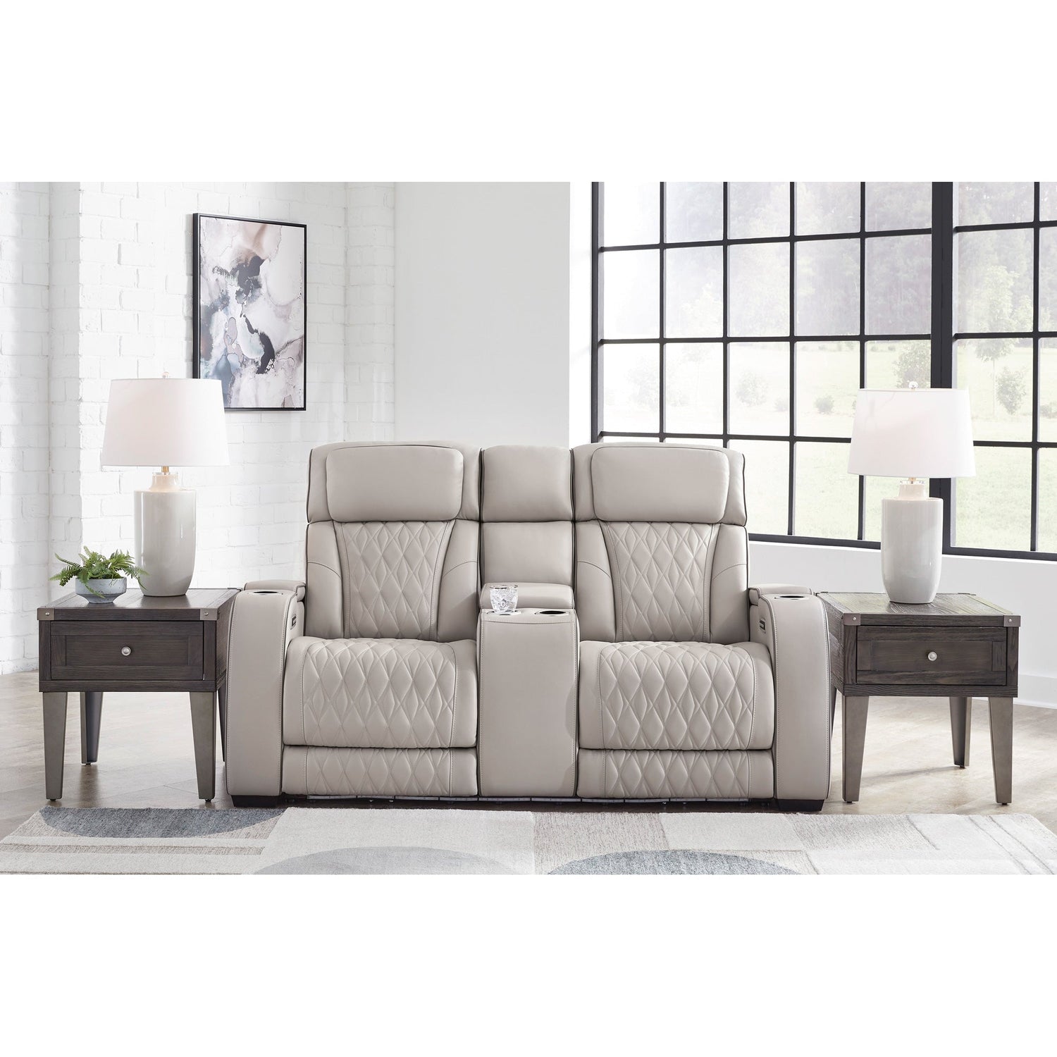 A room setting featuring Boyington Gray Power Reclining Loveseat