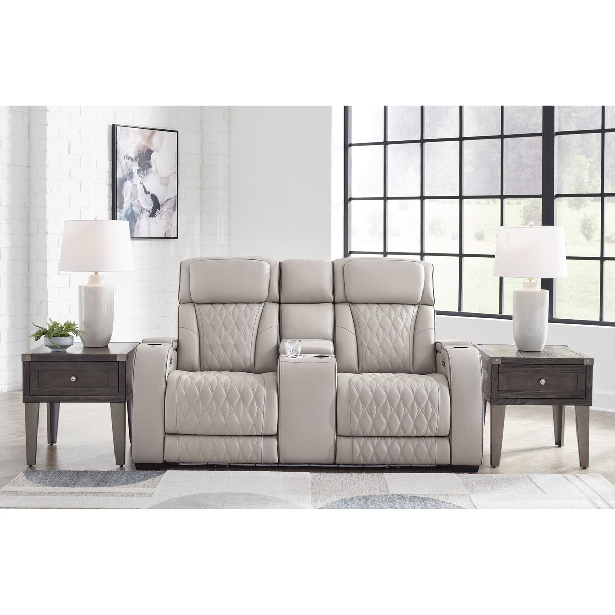 A room setting featuring Boyington Gray Power Reclining Loveseat