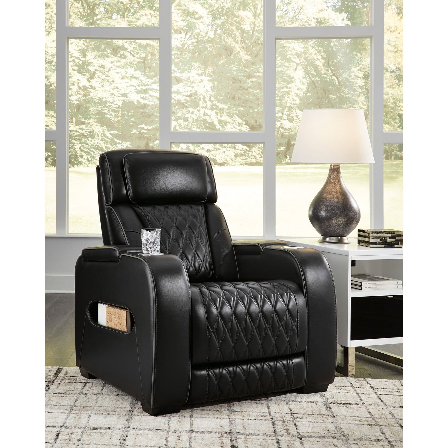 A room setting featuring Boyington Black Power Recliner