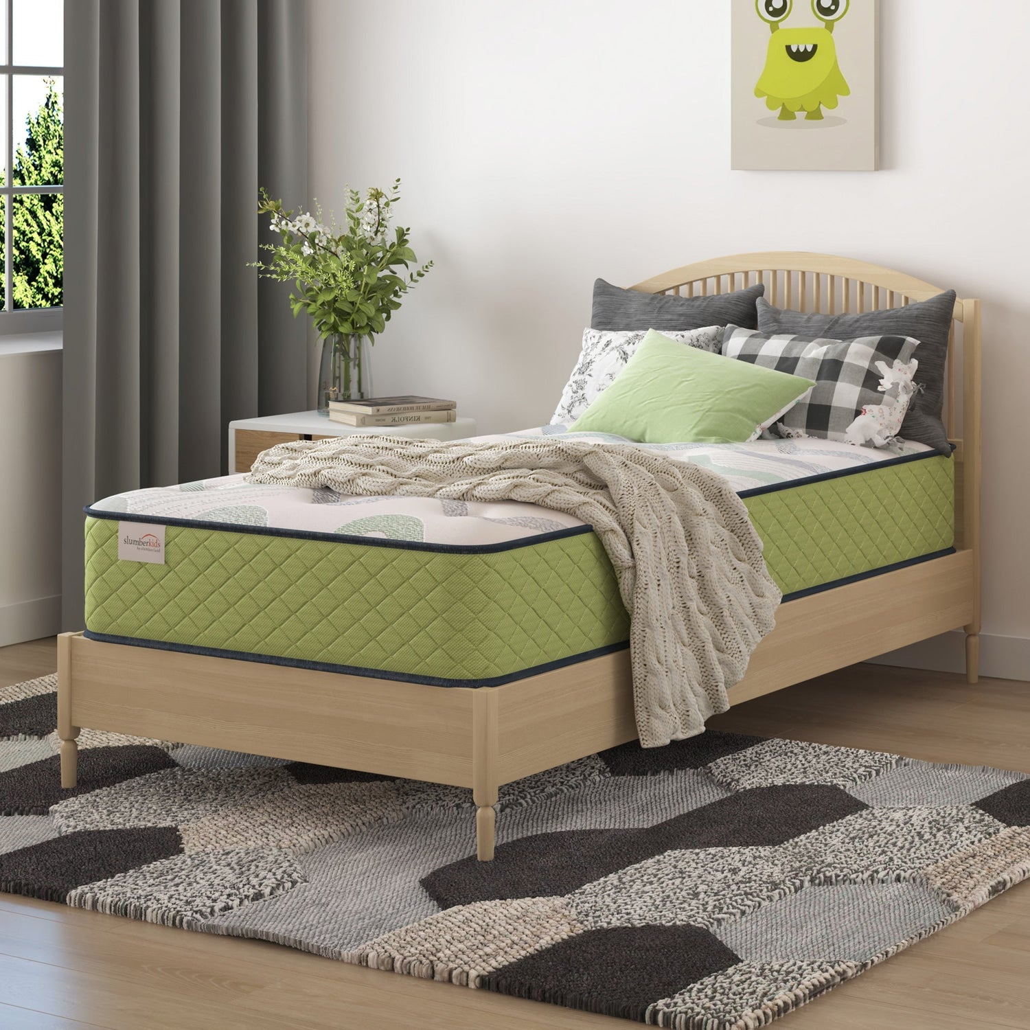 A room setting featuring SlumberKids Full Hybrid Mattress