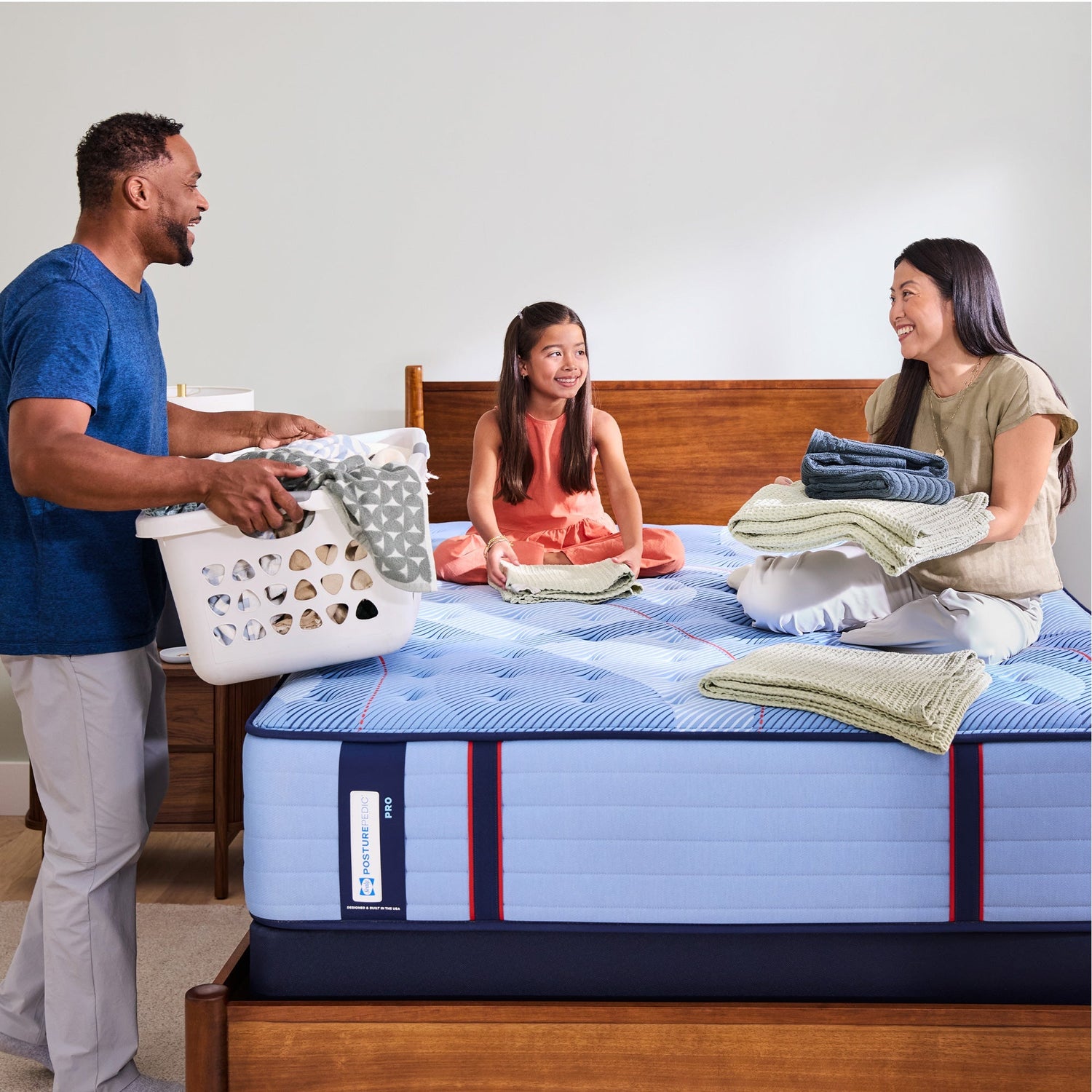 A room setting featuring Sealy Posturepedic Pro Indianapolis Medium Tight Top California King Mattress