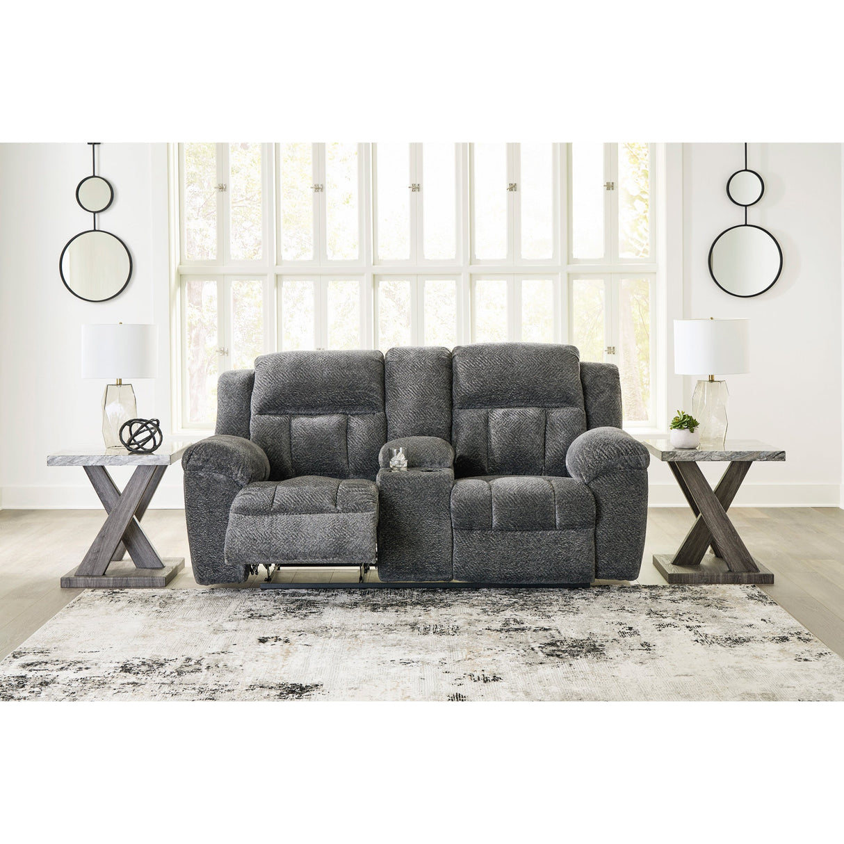 A room setting featuring Frohn Graphite Console Reclining Loveseat