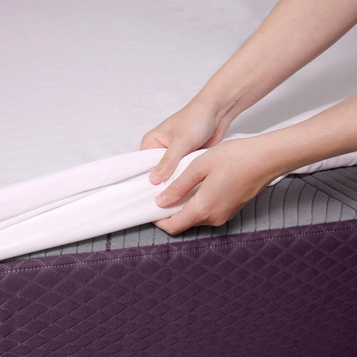 Side view of Purple Standard Twin Mattress Protector