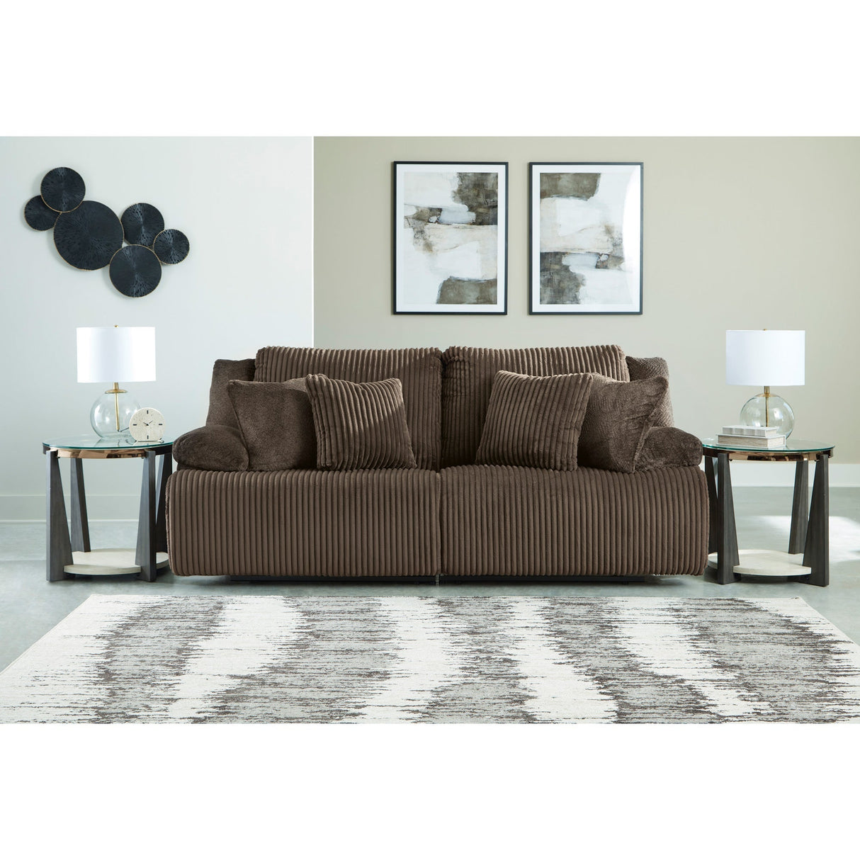 A room setting featuring Top Tier Chocolate 2 Piece Reclining Sofa
