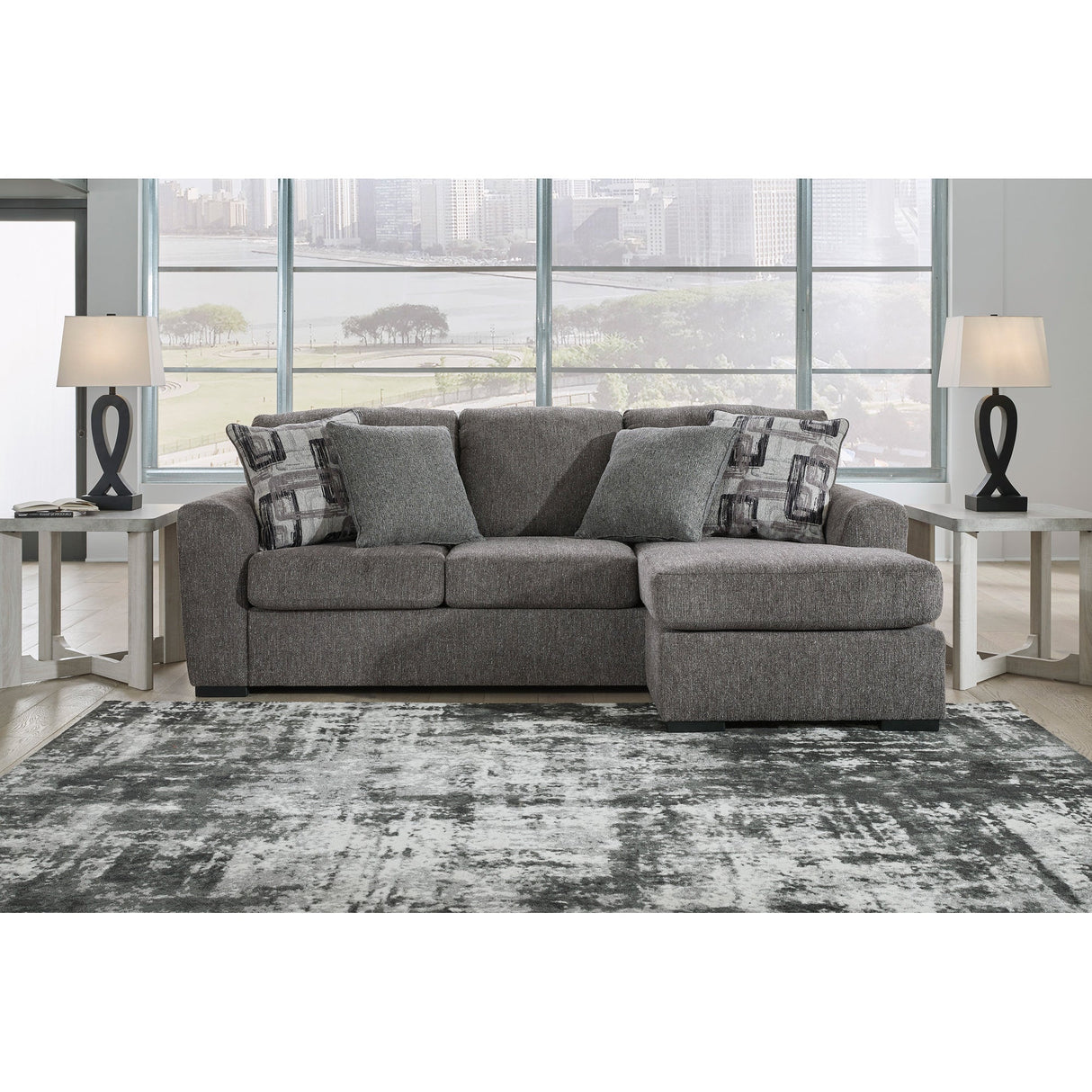 A room setting featuring Gardiner Pewter Sofa Chaise