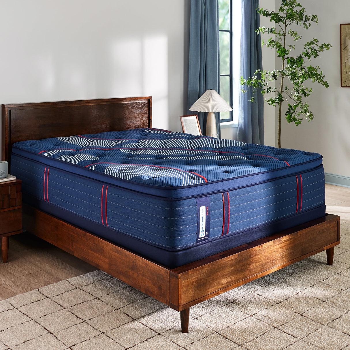 A room setting featuring Sealy Posturepedic Elite Albany Soft Pillowtop Split King Mattress