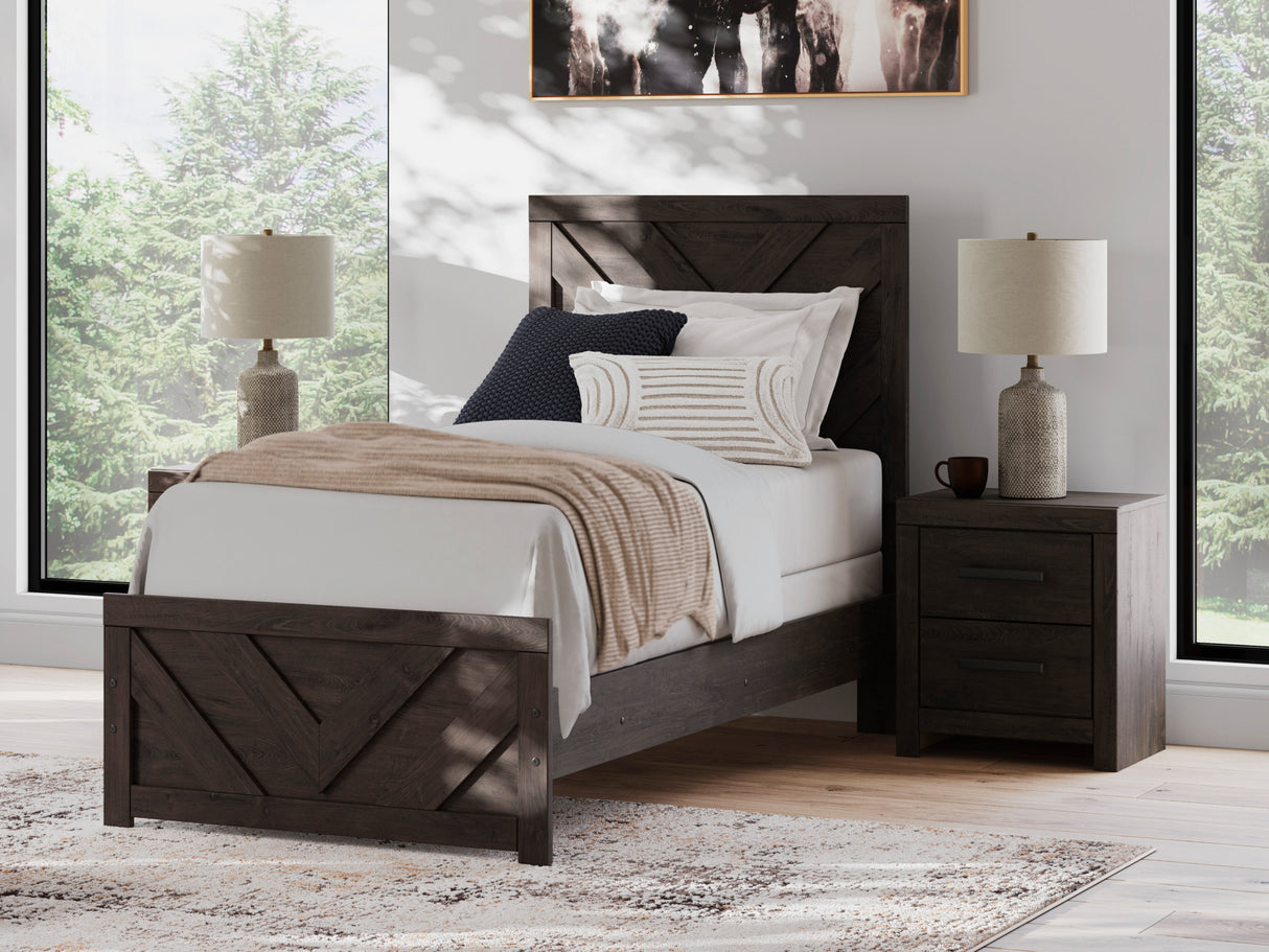 A room setting featuring Prendonea Charcoal Twin Panel Bed