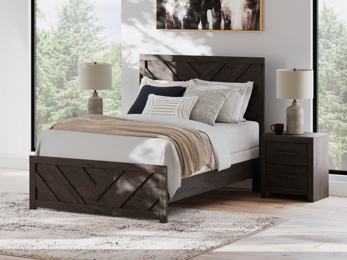A room setting featuring Prendonea Charcoal Full Panel Bed