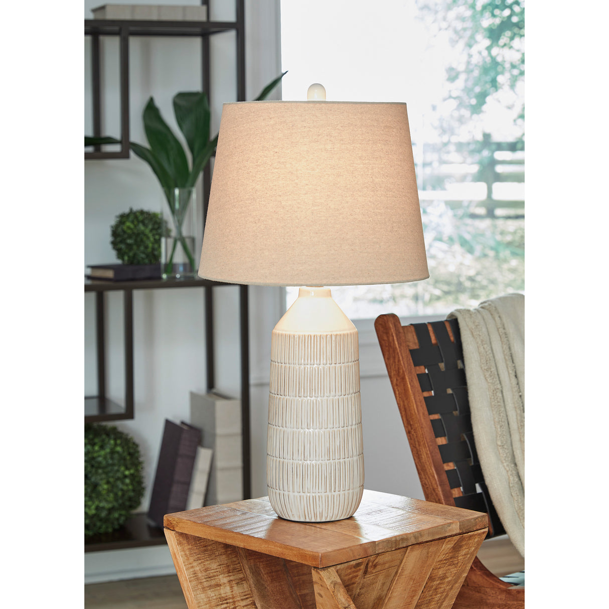 A room setting featuring Willport WhiteTable Lamp