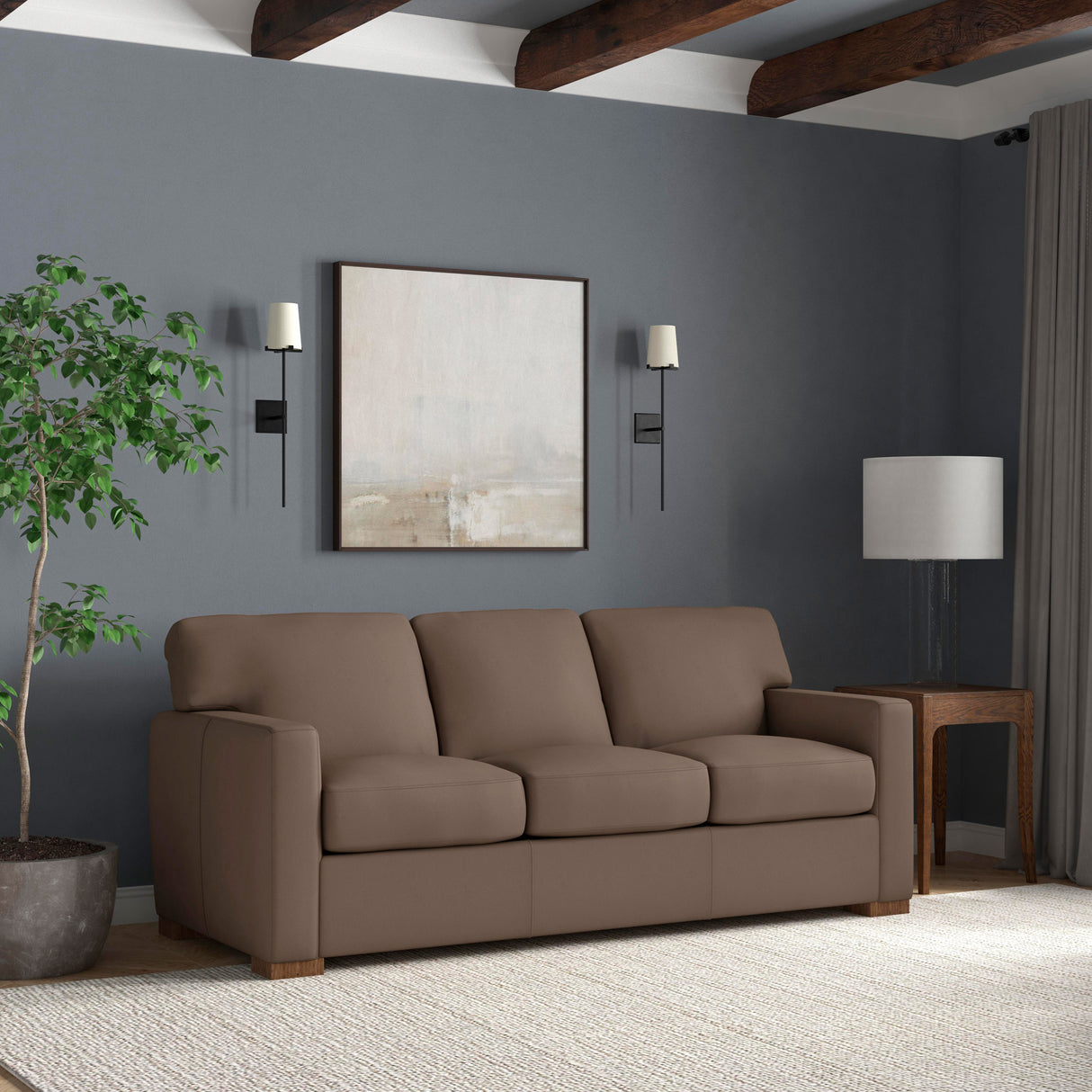 A room setting featuring Bryant Dark Stone Leather Sofa