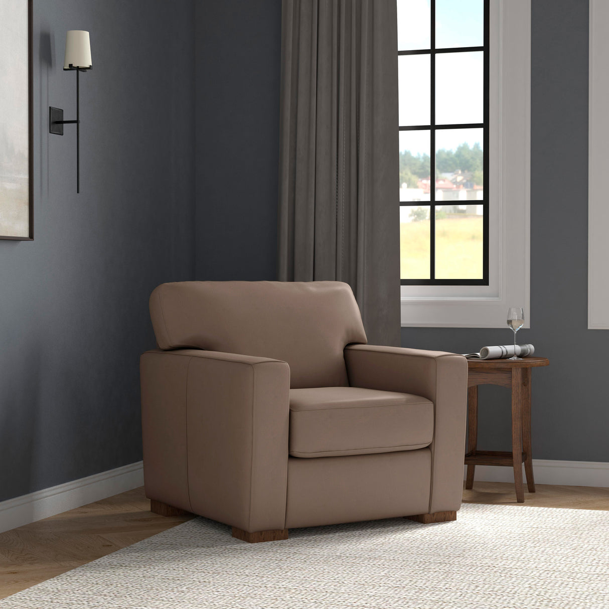 A room setting featuring Bryant Dark Stone Leather Chair