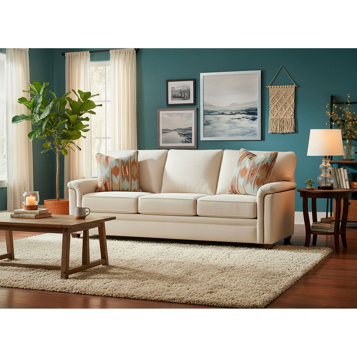 A room setting featuring Warren Twine Feather Blend Nail Head Sofa