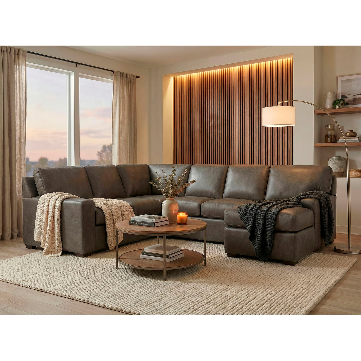 A room setting featuring Merritt Carbone 3 Piece Feather Blend Leather Right Chaise Sectional