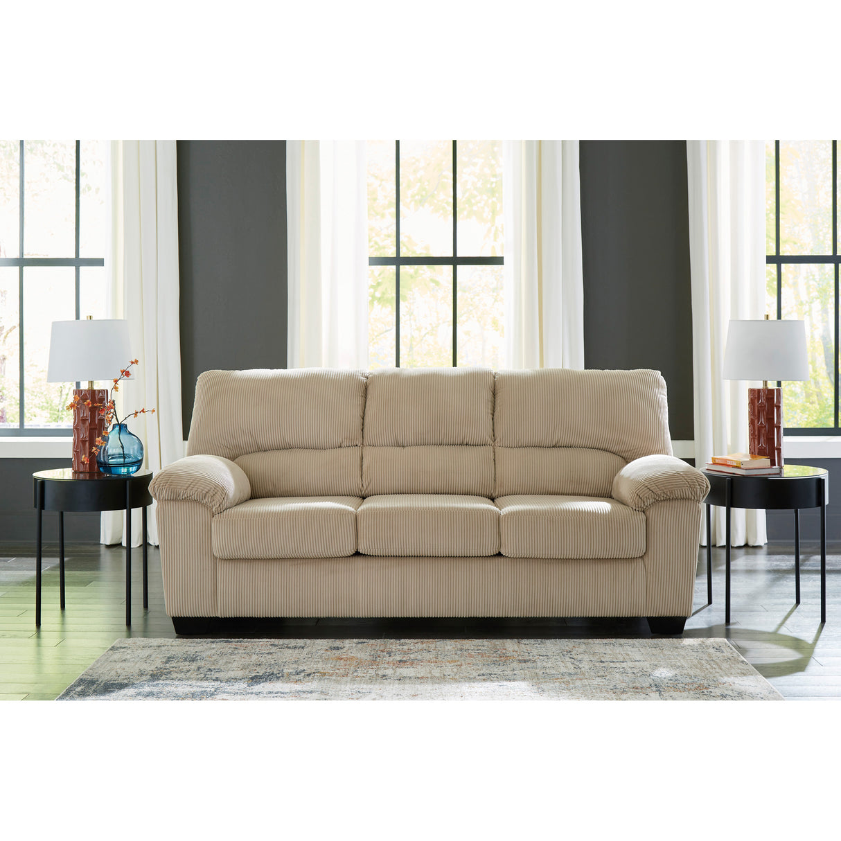 A room setting featuring SimpleJoy Sand Sofa