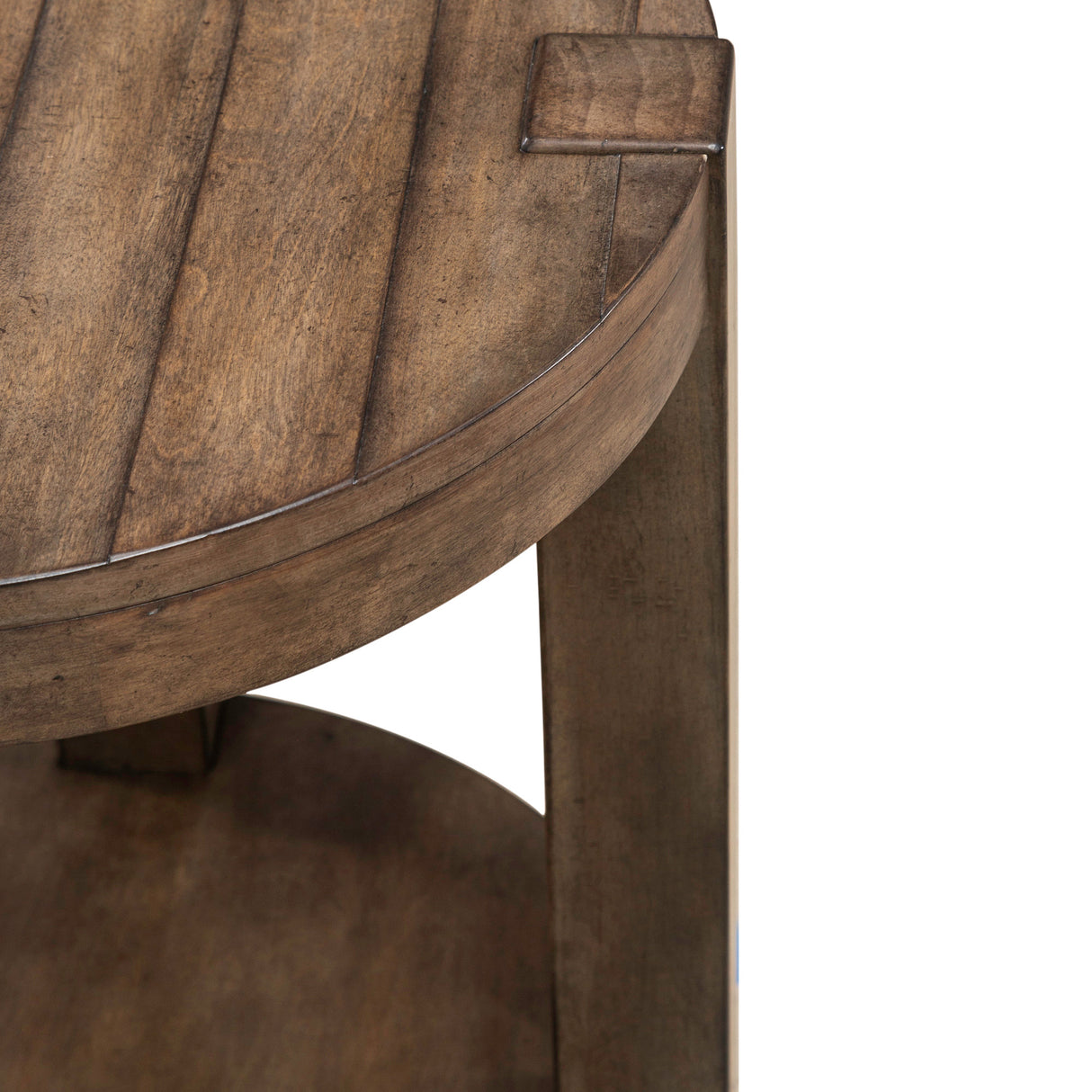 Detail view of Broadmore Cobblestone Brown Round Chairside Table