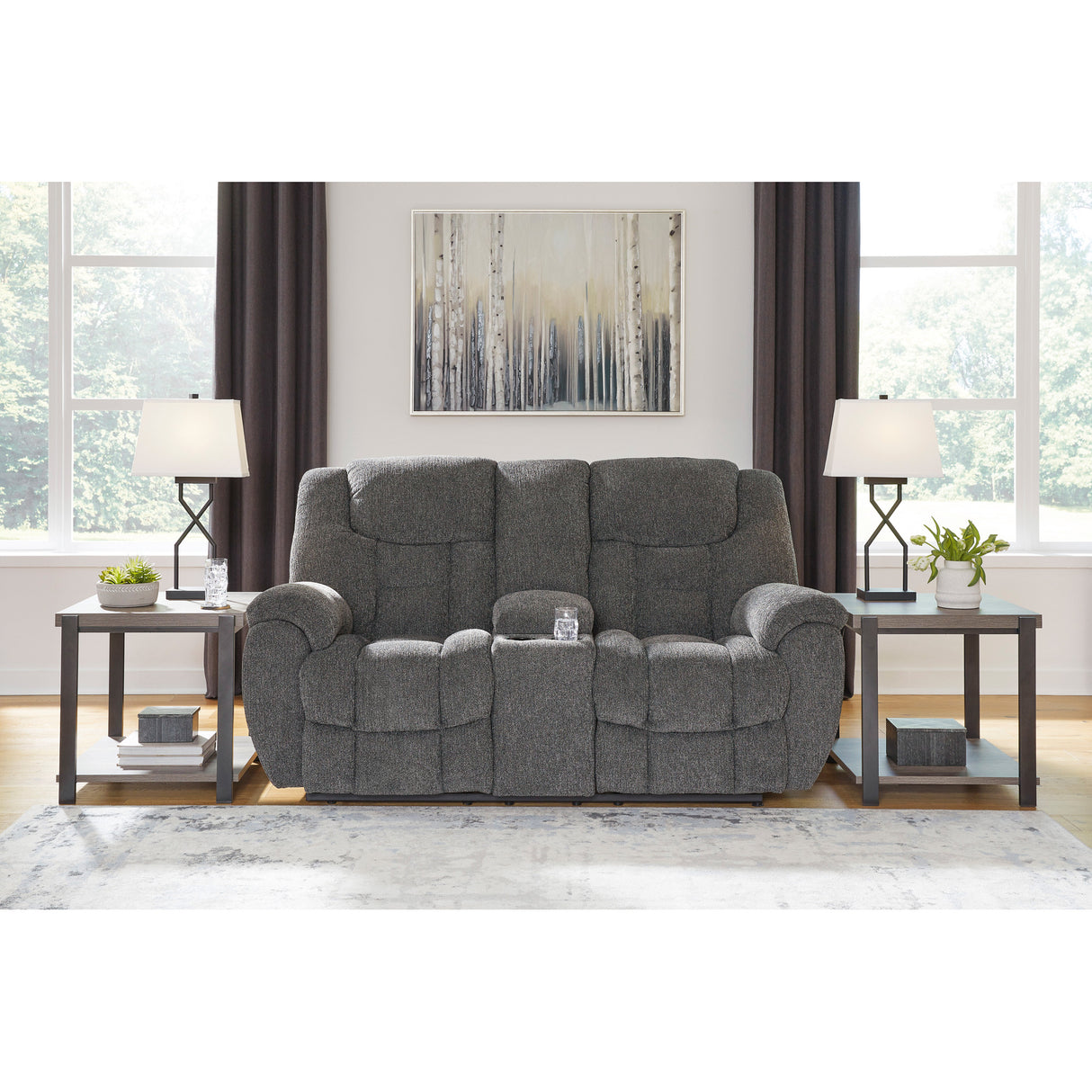 A room setting featuring Foreside Charcoal Reclining Console Loveseat