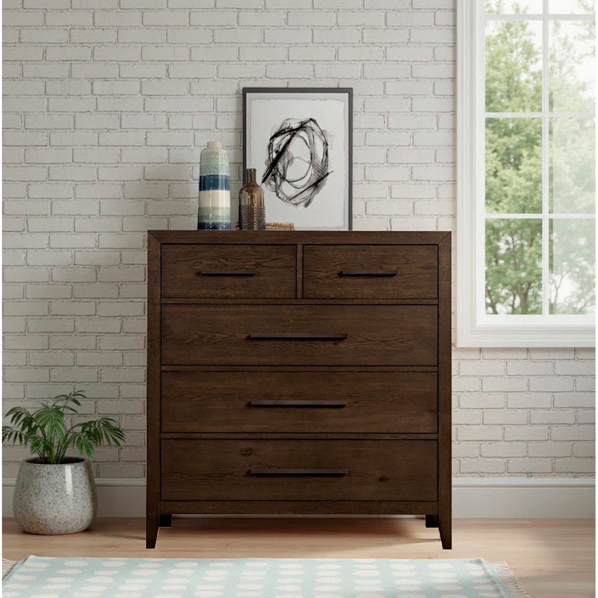 A room setting featuring Norwich Rustic Driftwood Oak 5 Drawer Chest