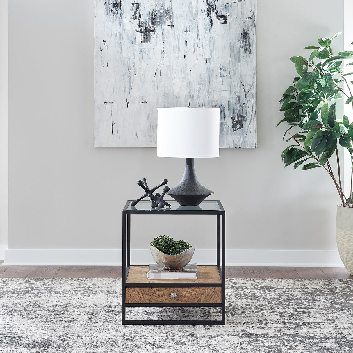 A room setting featuring Bedford Weathered Oak End Table