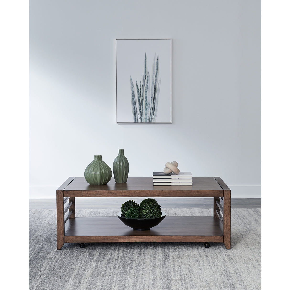 A room setting featuring Shaker Lakes Harvest Brown Coffee Table